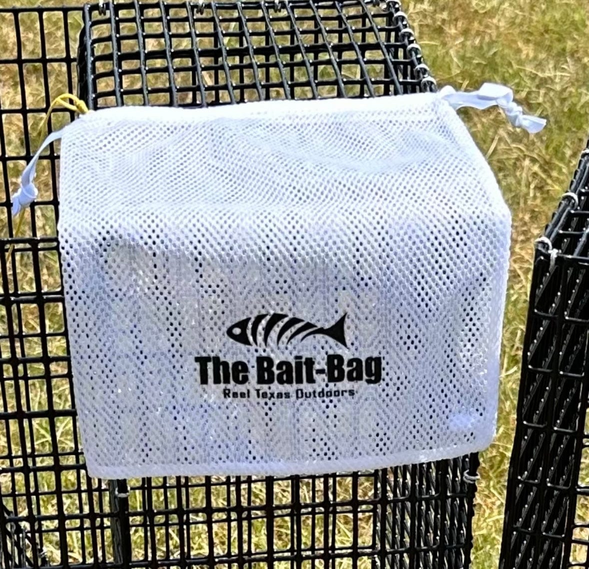 fishing bait bag laid on top of a fish trap